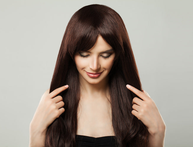 Haarteile/Topper vs. Extensions: Was ist besser für mehr Volumen?